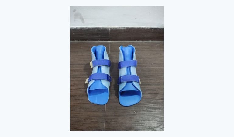 Pair of custom paediatric orthoses in blue, made at Limbgenixx for a child