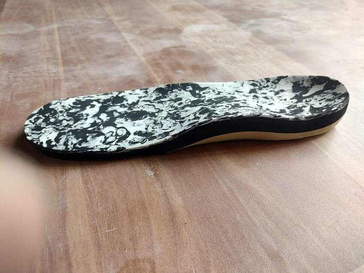 Custom pressure-relieving insole for a diabetic foot