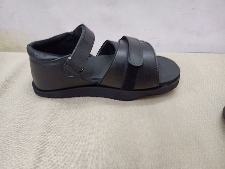 Orthopaedic sandal side profile showing cushioned sole
