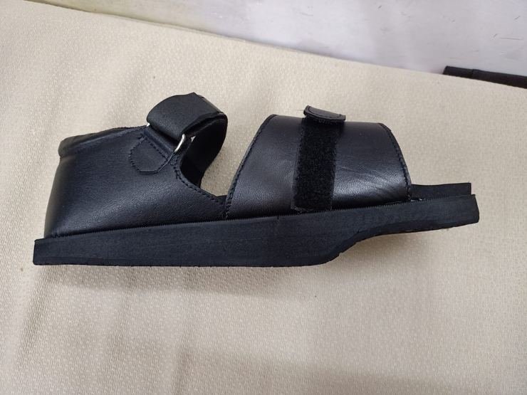 Orthopaedic sandal with hook-and-loop adjustable straps