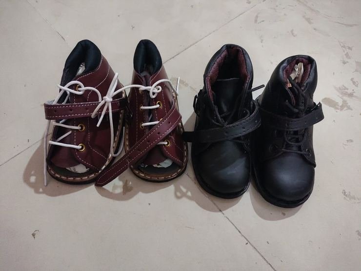 Pairs of children&rsquo;s orthopaedic boots made at Limbgenixx