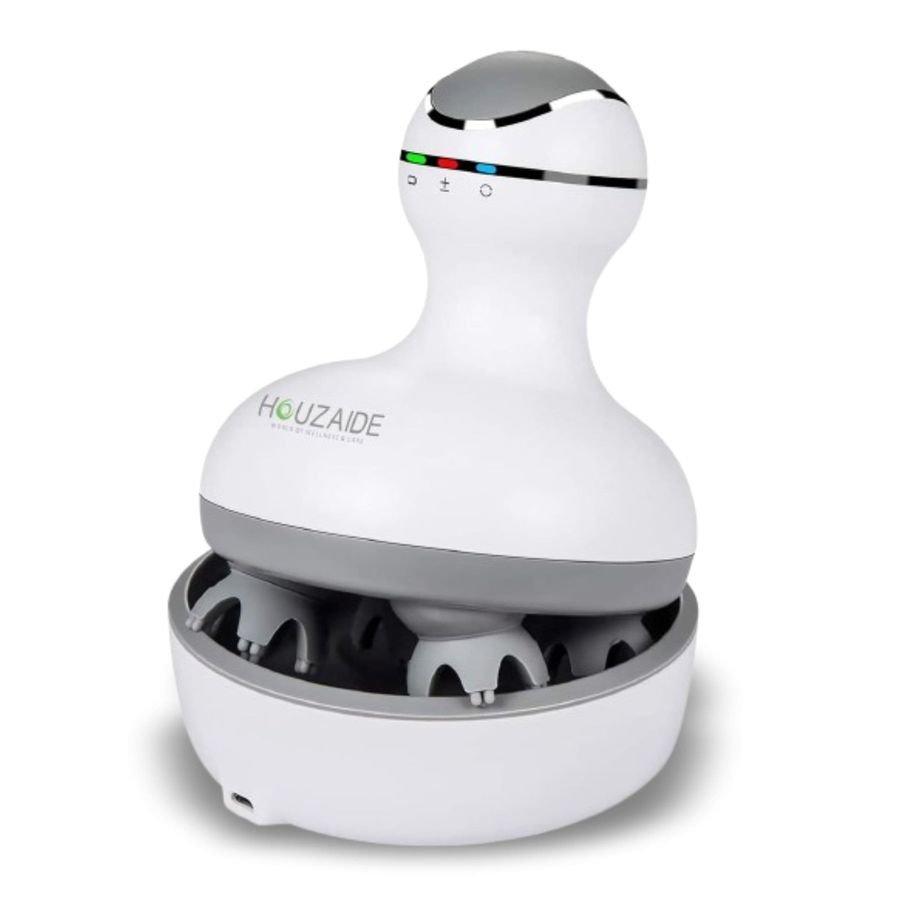 HOUZAIDE head massager in a gourd shape with three coloured indicator lights, resting in its round storage base