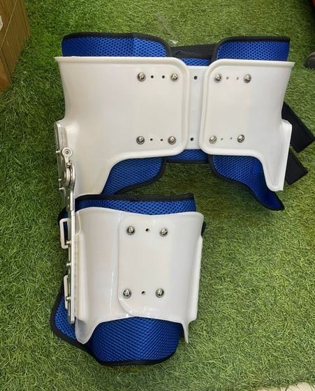 Paediatric hip abduction orthosis with padded thigh sections