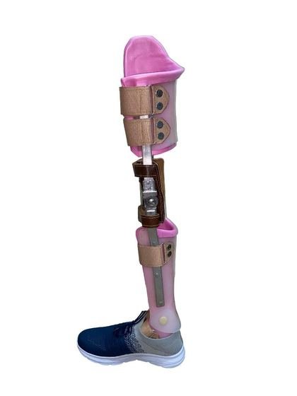 Paediatric KAFO shown fitted with the child&rsquo;s own footwear