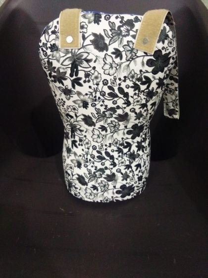 Custom spinal brace rear view showing closure straps