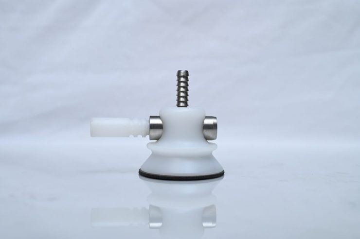 Prosthetic suction valve with tube fitting