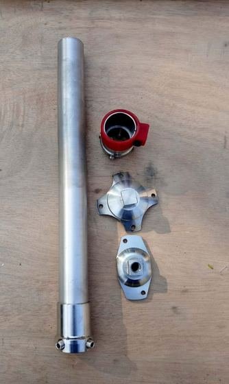 Prosthetic pylon tube with socket adapters and clamp
